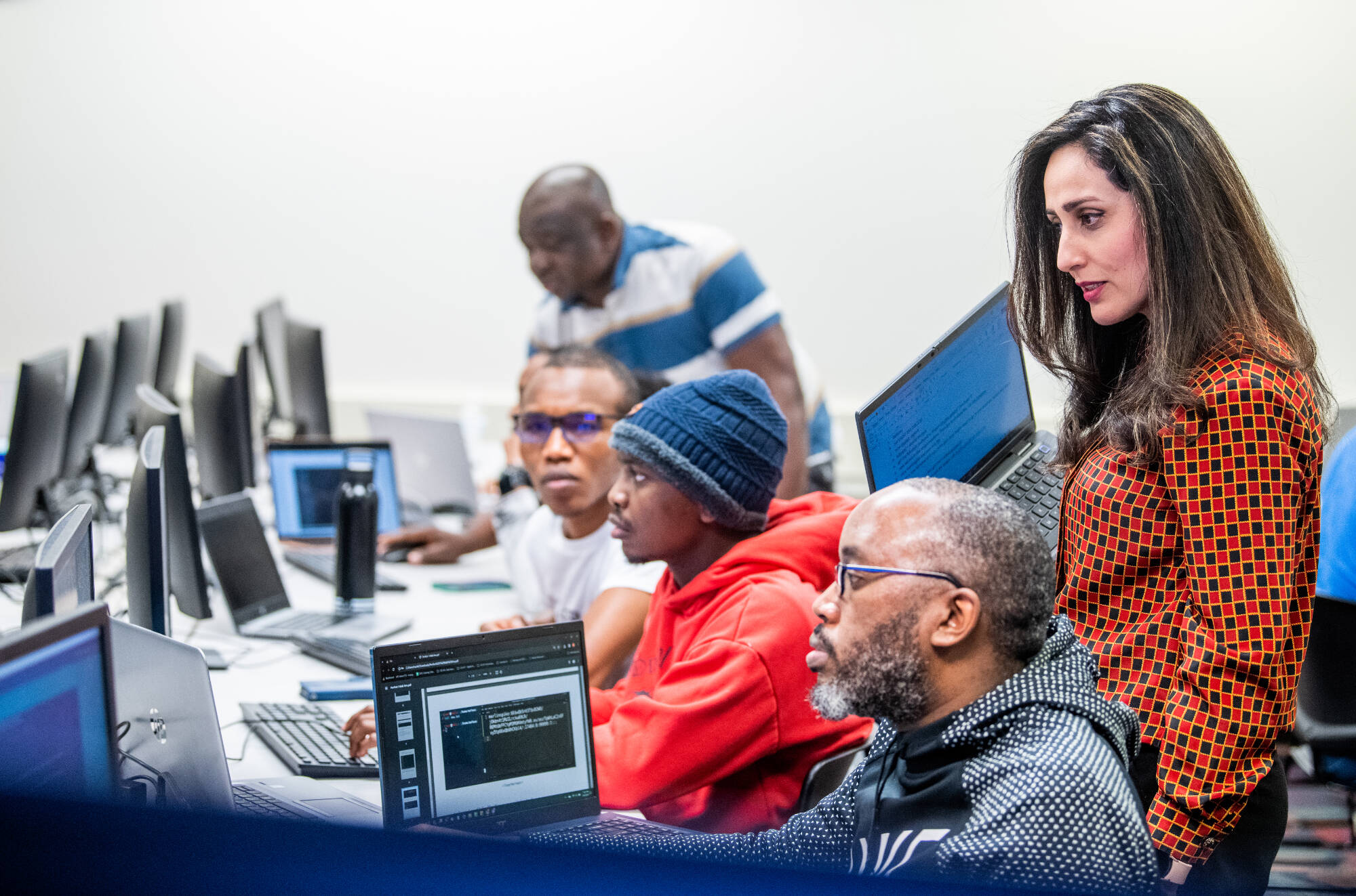Students and faculty working in the CyberRange